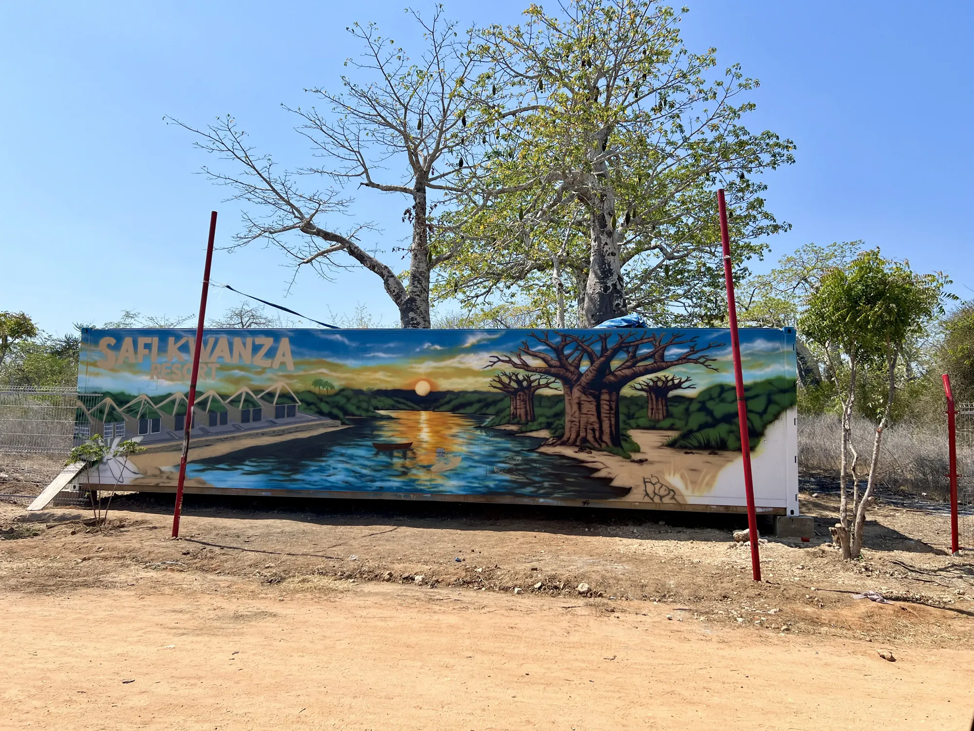 Safi Kwanza Resort entrance mural beside the Kwanza River