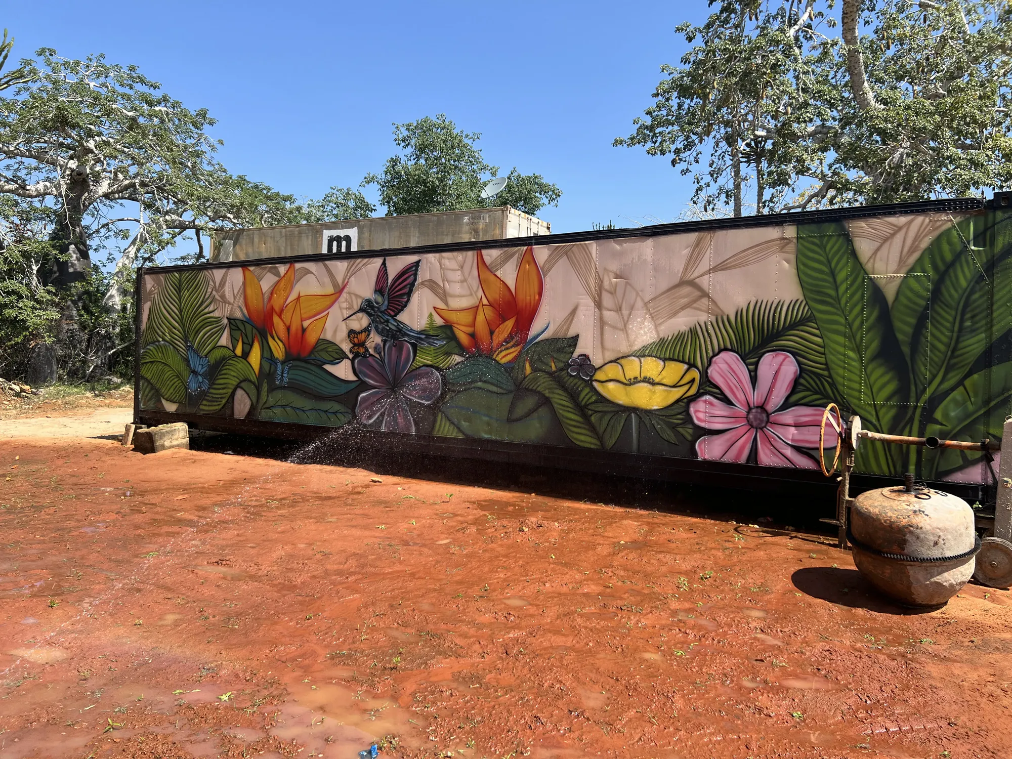 Tropical floral mural on a resort building exterior
